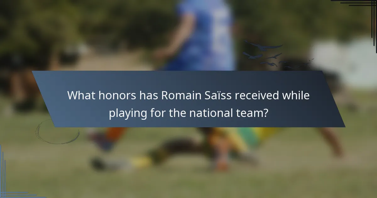 What honors has Romain Saïss received while playing for the national team?